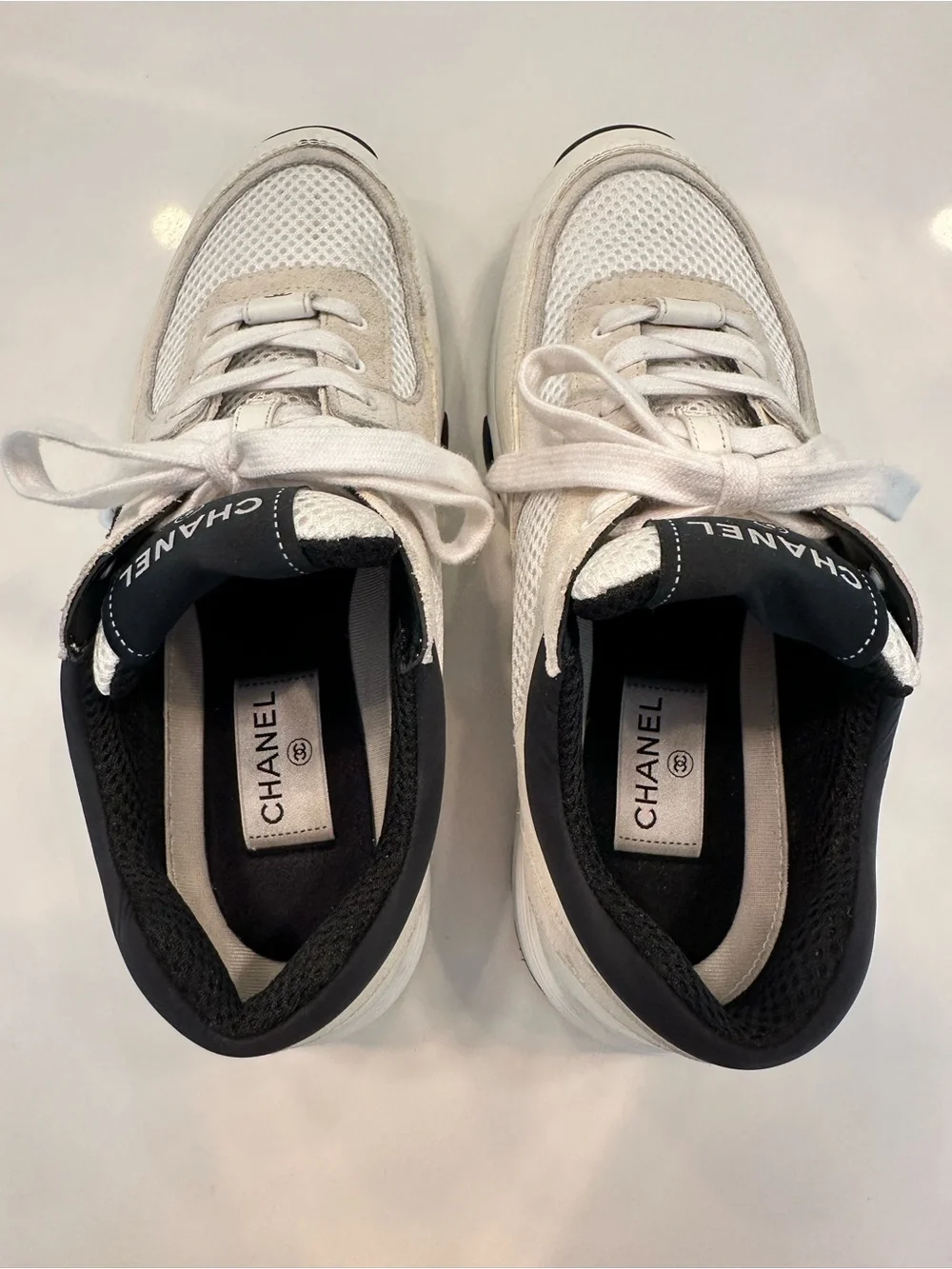 CHANEL White and Black Sneakers
